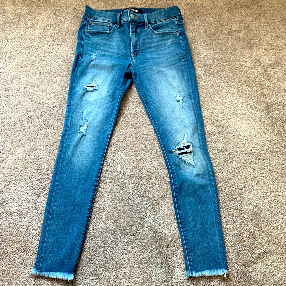 Express Mid Rise Medium Wash Raw Hem Skinny Jeans